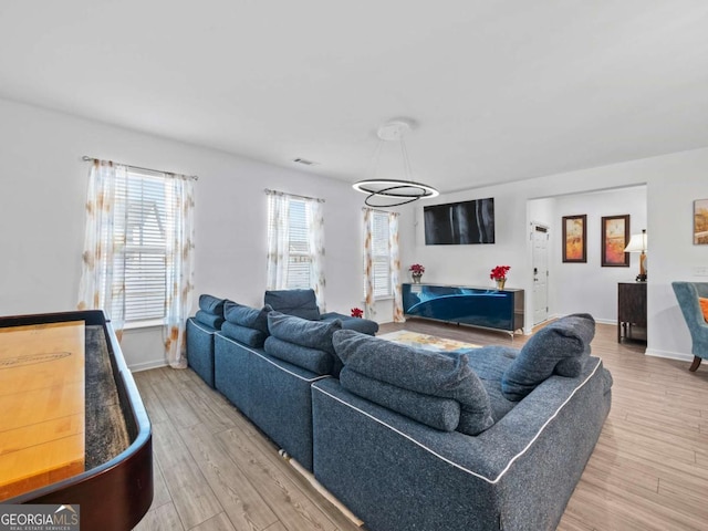 living room with wood-type flooring