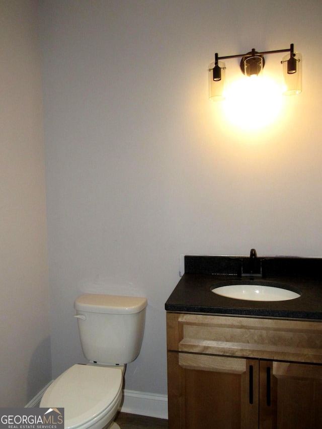 bathroom with toilet and sink