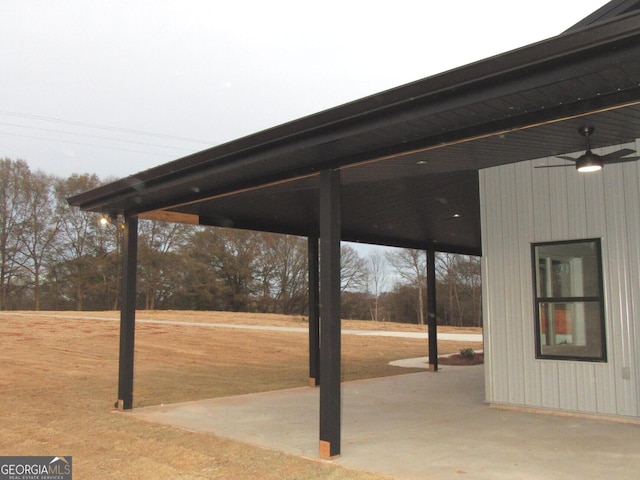 view of patio featuring ceiling fan