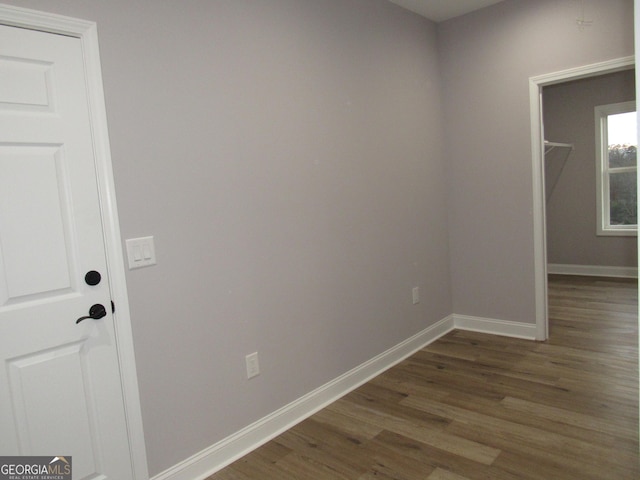 interior space with dark hardwood / wood-style flooring