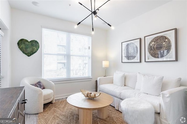 living room with a notable chandelier