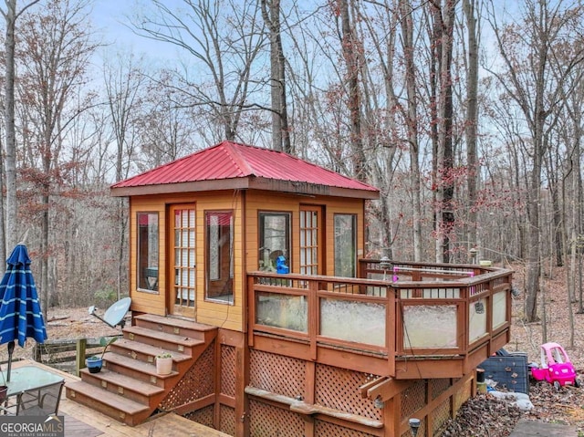 deck with an outbuilding