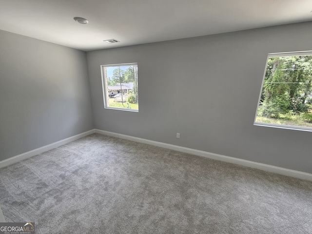 view of carpeted spare room