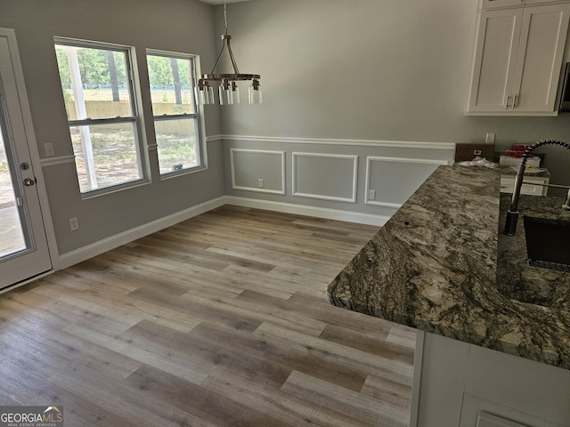 dining room featuring light wood-type flooring