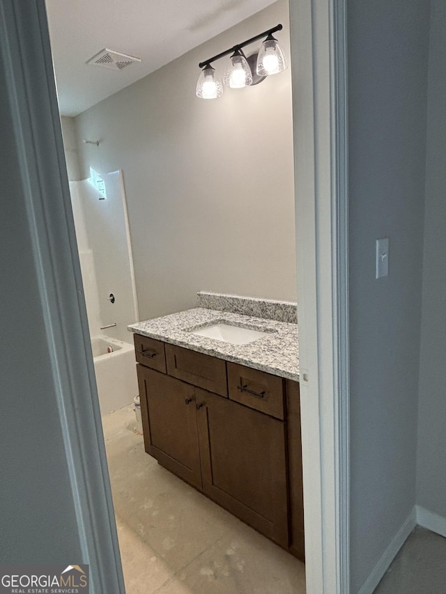 bathroom with  shower combination and vanity