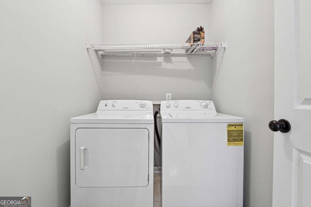 laundry area featuring independent washer and dryer