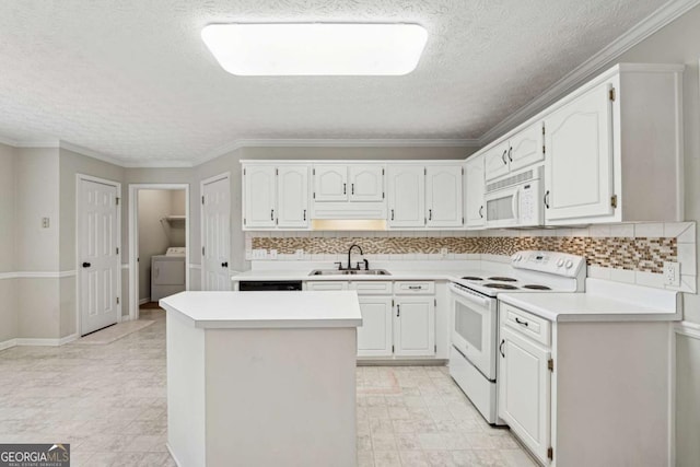 kitchen featuring sink, white appliances, washer / dryer, decorative backsplash, and white cabinets