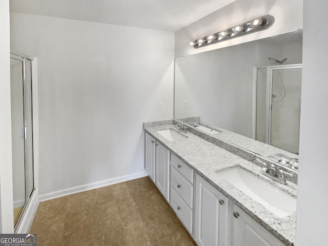 bathroom featuring vanity and walk in shower