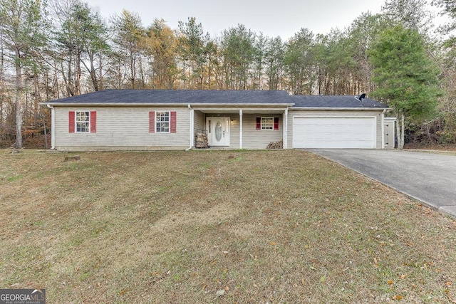 ranch-style house with a front lawn and a garage