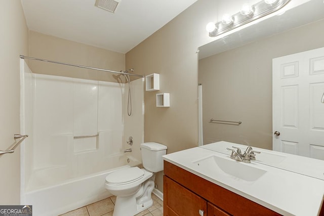 full bathroom with tile patterned floors, vanity, shower / bath combination, and toilet