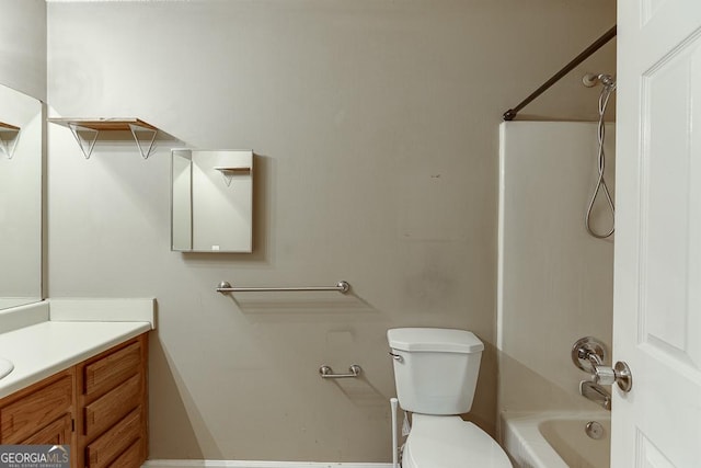 full bathroom featuring shower / washtub combination, vanity, and toilet