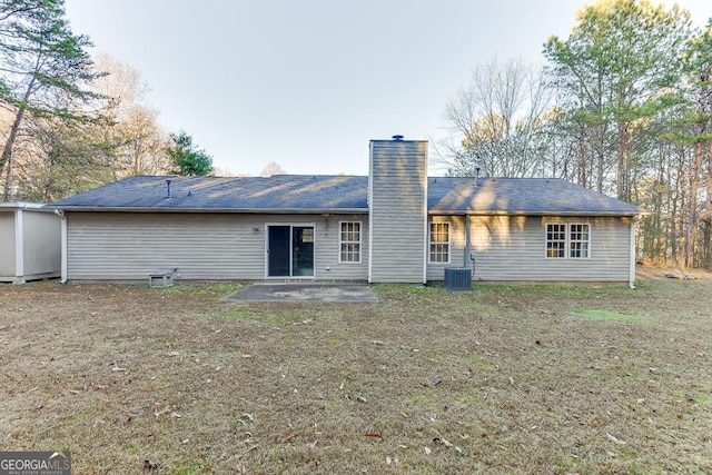 back of house with central AC and a patio area