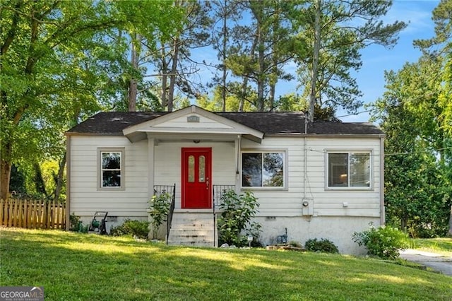 view of front of house with a front lawn