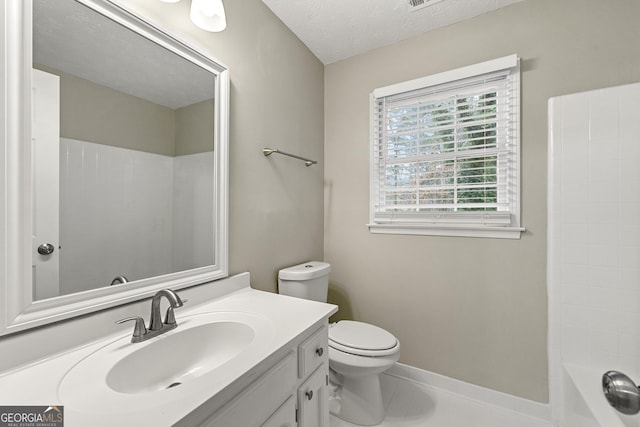 full bathroom featuring a textured ceiling, vanity,  shower combination, and toilet