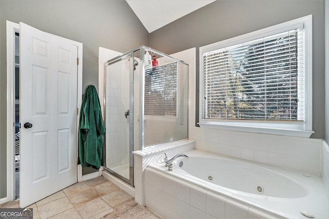 bathroom featuring independent shower and bath