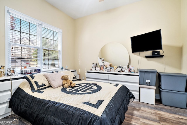 bedroom featuring hardwood / wood-style floors