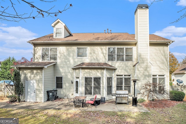 rear view of property with a patio