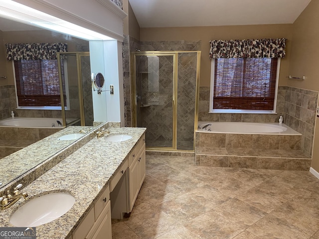 bathroom featuring tile patterned flooring, vanity, and independent shower and bath