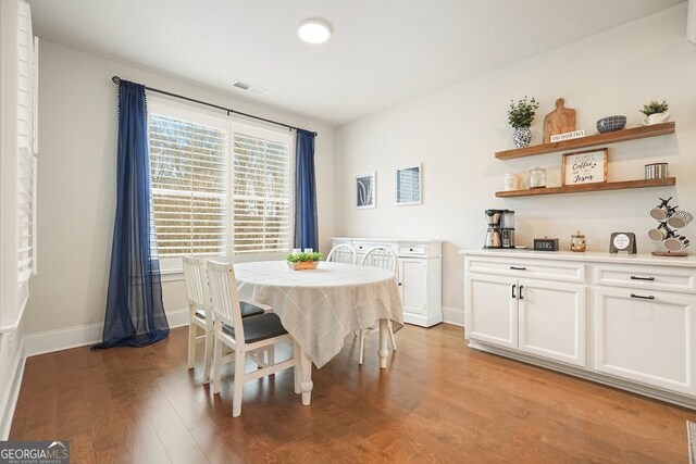 dining area with light wood-type flooring