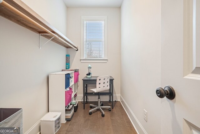 home office featuring hardwood / wood-style floors