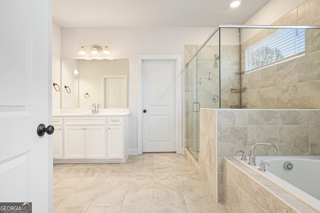 bathroom with independent shower and bath and vanity