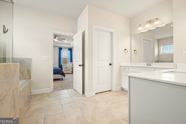 bathroom featuring vanity, tile patterned flooring, and ceiling fan