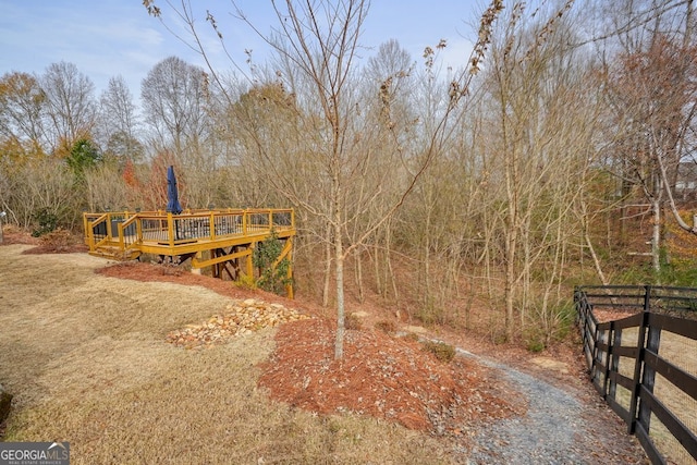 view of yard with a wooden deck