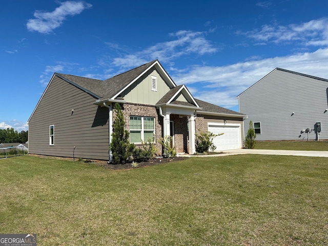 view of front of house featuring a garage and a front lawn