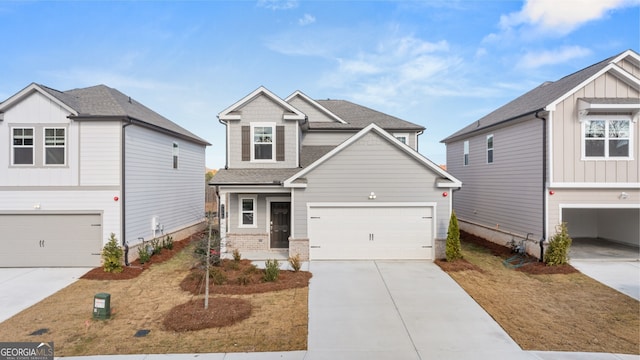 view of front of property with a garage