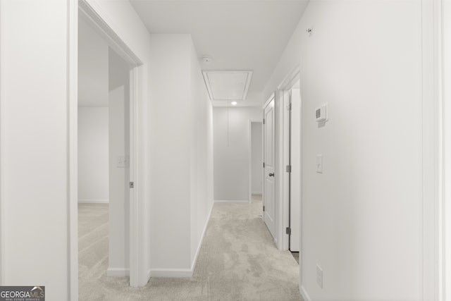 corridor with light carpet