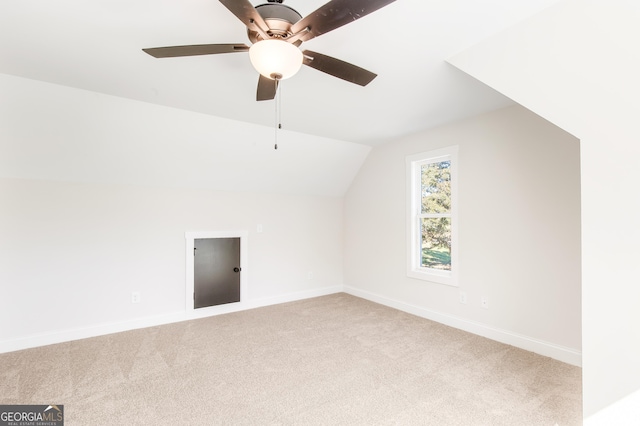 bonus room featuring ceiling fan, lofted ceiling, and carpet floors