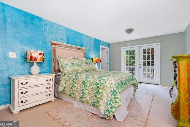 carpeted bedroom featuring french doors and access to outside