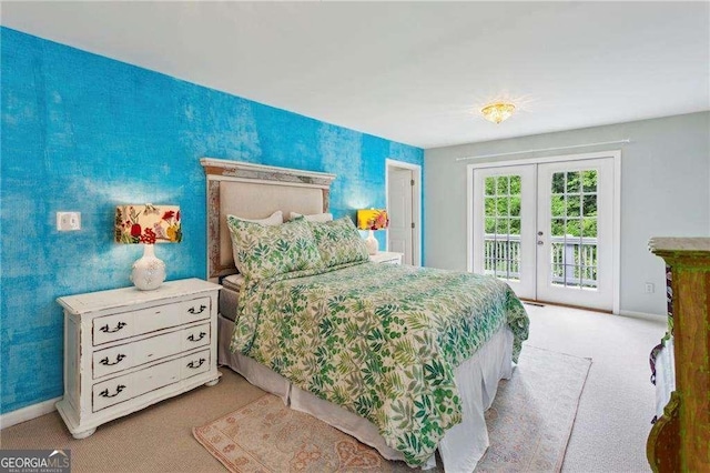 carpeted bedroom featuring access to exterior and french doors