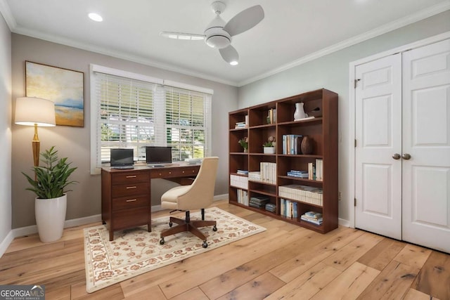 office space featuring light hardwood / wood-style floors, ceiling fan, and crown molding