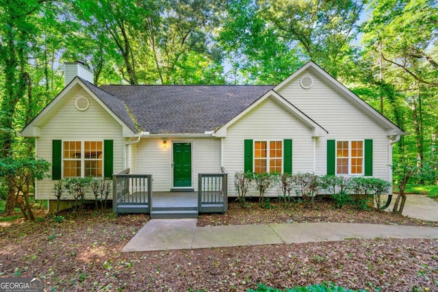 ranch-style home with a deck