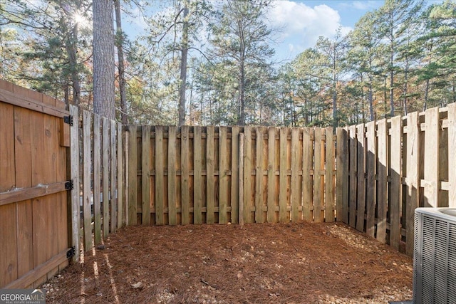 view of yard with central AC