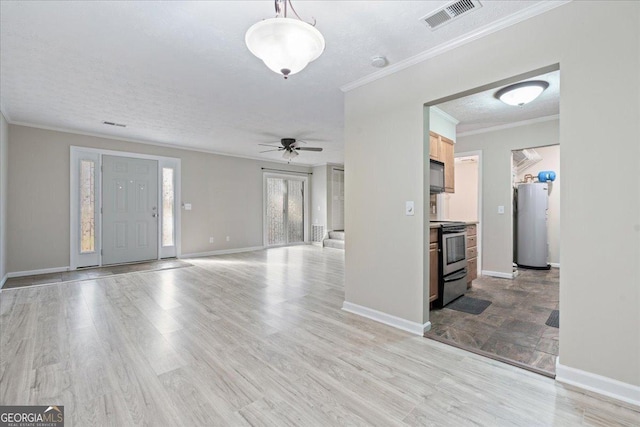 entrance foyer with water heater, light hardwood / wood-style flooring, ceiling fan, and crown molding