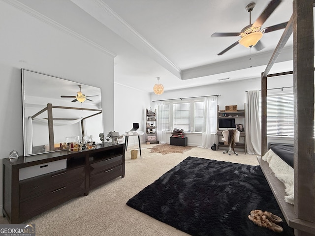 carpeted bedroom with crown molding and ceiling fan