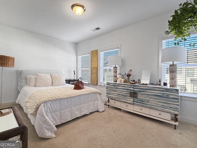 bedroom featuring carpet