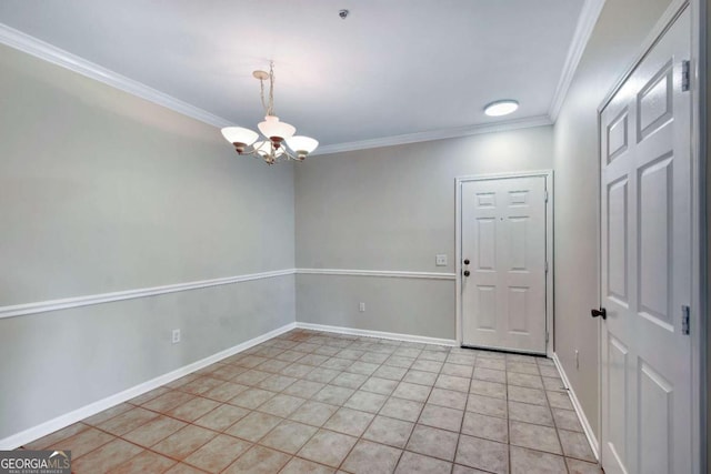 empty room with light tile patterned floors, a chandelier, and ornamental molding