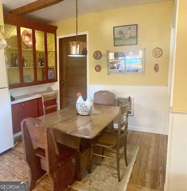 dining room featuring hardwood / wood-style flooring