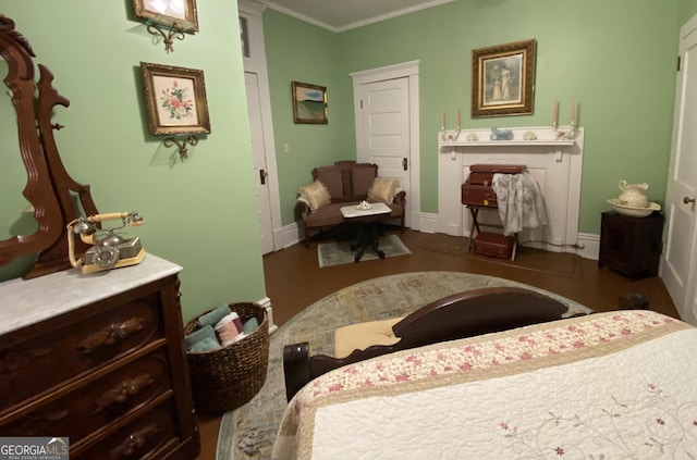 bedroom with crown molding