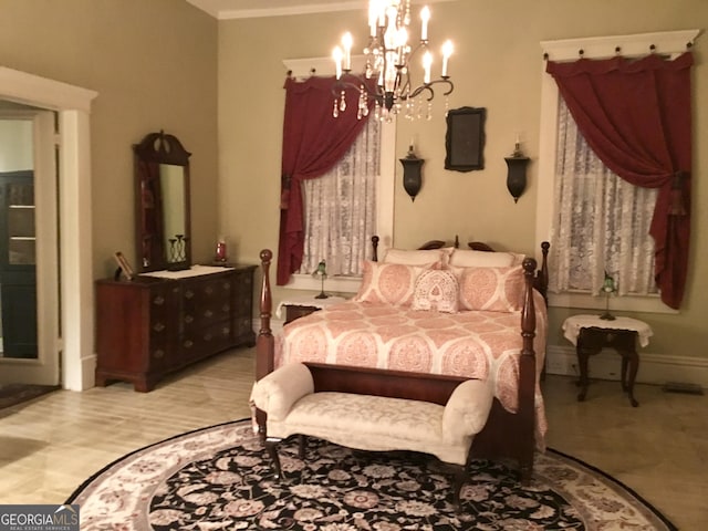 bedroom with a chandelier