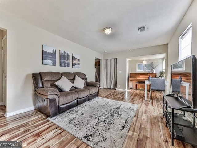 living room with light wood-type flooring