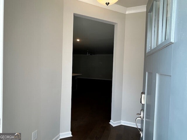 hall with dark hardwood / wood-style flooring