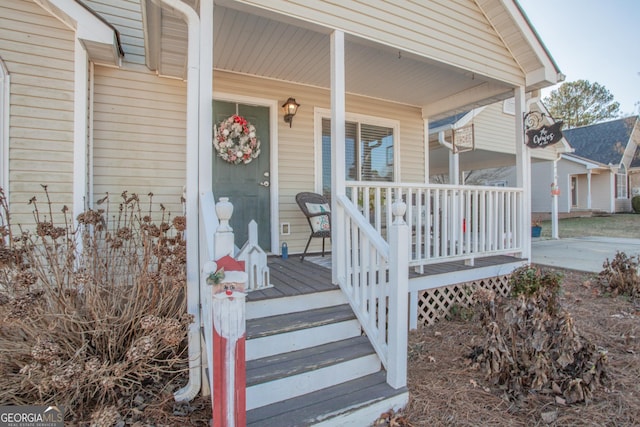 entrance to property with covered porch