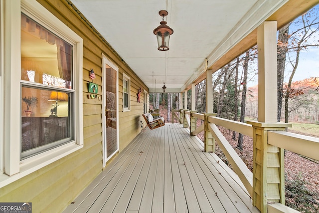 deck featuring a porch