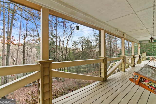 wooden deck featuring covered porch