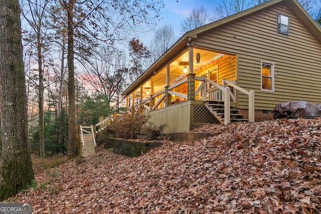 view of property exterior at dusk