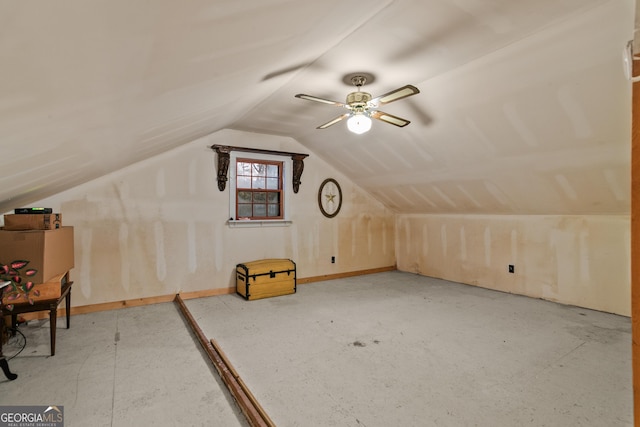 additional living space with vaulted ceiling and ceiling fan